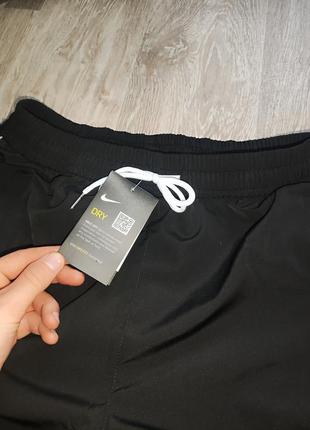 Нейлоновые брюки найк на лампасах6 фото