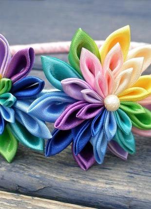 Різнобарвний обідок для волосся з квітами для дівчинки2 фото