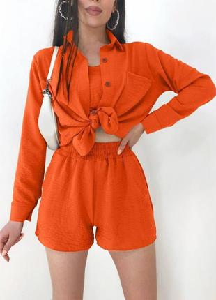 Оранжевый костюм с шортами1 фото
