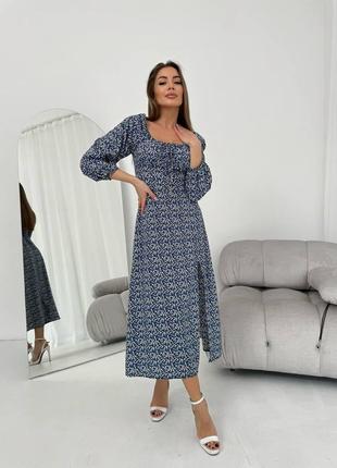 Модна жіноча сукня міді у квітковий прінт синя новинка 2024