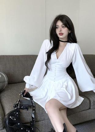 Стильна лялькова біла сукня з v-подібним вирізом нова1 фото