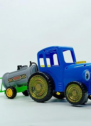 Музыкальная игрушка star toys "синий трактор" с прицепом поливалкой 72591-2
