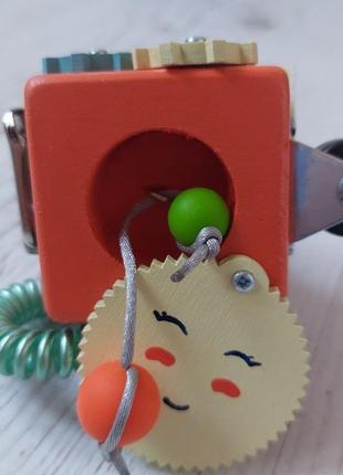 Бизикубик с солнышком, деревянная развивающая игрушка4 фото
