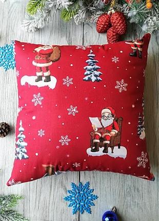 Декоративна подушка новорічна бавовняна гіпоалергенна "санта клауси на червоному", 35 см * 35 см3 фото