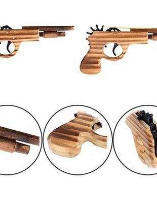 Дерев'яний пістолет, що стріляє гумками3 фото
