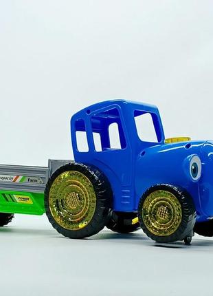 Музична іграшка star toys "синій трактор" із причепом 72591-1