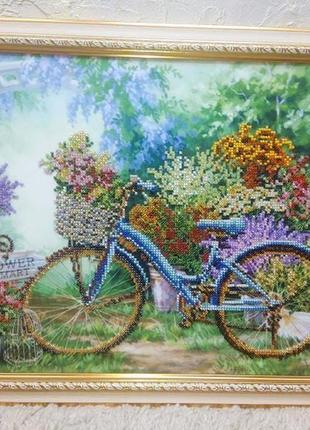Картина бісером виставка квітів, прованс, велосипед, альтанка1 фото