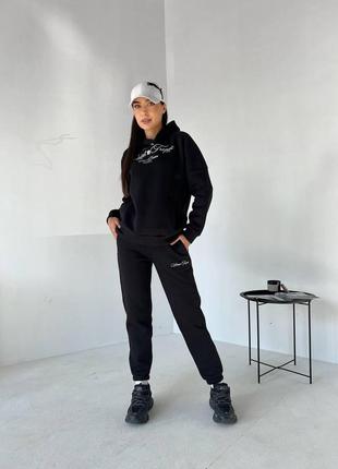 Жіночий спортивний костюм на флісі пенье чорного кольору 25531 n 46/481 фото