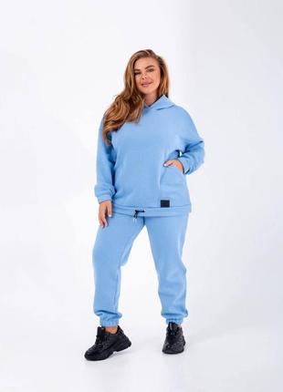 Стильний жіночий спортивний костюм блакитного кольору 25373 n 46/484 фото