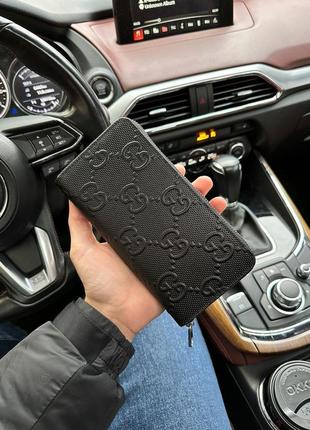 Gucci wallet black embossed leather