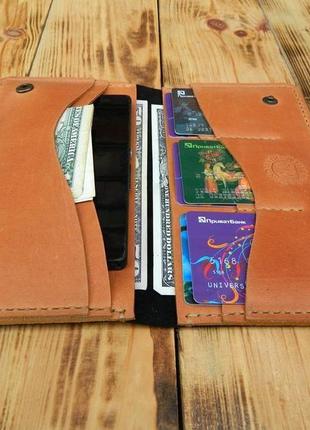 Шкіряний гаманець виконаний в цікавому поєднанні двох кольорів3 фото