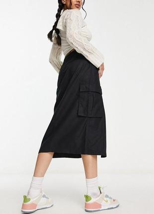 Стильная юбка длины миди.3 фото