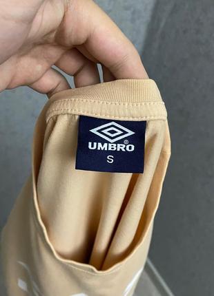 Персиковая футболка от бренда umbro5 фото