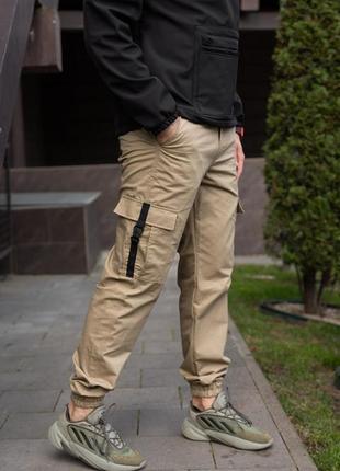 Мужские коттоновые повседневные брюки карго с боковыми карманами бежевые7 фото
