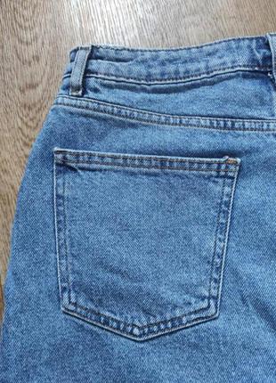 Короткая джинсовая юбка с высокой талией мини юбка с потертостями и необработанным низом6 фото