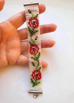Плетений браслет з бісеру; з малюнком квітів3 фото