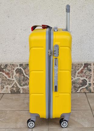 Средний размер чемодана carbon  k 147 yellow3 фото
