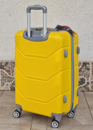 Средний размер чемодана carbon  k 147 yellow4 фото