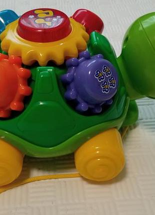 Інтерактивна черепаха vtech каталка співає 2