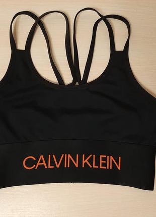 Спортивный топ calvin klein performance9 фото