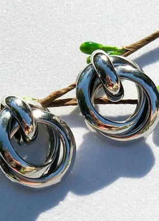 Трендовые серьги узелки серебро, базовые серёжки в виде узелков8 фото