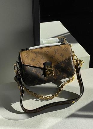 Louis vuitton pochette métis east west bag