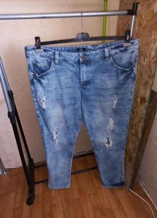 Стильные джинсы с высокой посадкой и разрезами 54-56 размер