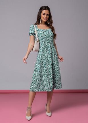 Ретро платье с цветным принтом и разрезом7 фото