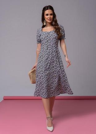 Ретро платье с цветным принтом и разрезом1 фото