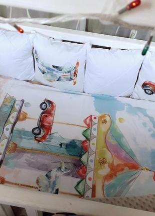 Комплект в детскую кроватку для мальчика "карусель"2 фото
