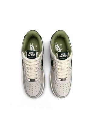 Жіночі кросівки nikeair force 1 light gray green5 фото