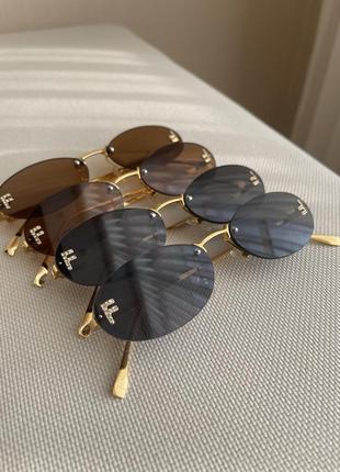 Солнцезащитные очки без оправы в стиле fendi в черном цвете3 фото
