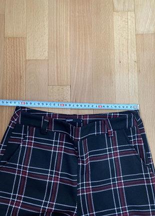 Брюки в клетку прямого кроя