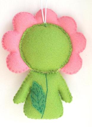 М'яка іграшка - малюк рожевий квіточку4 фото