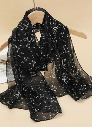 Женский шарф с нотами 150 на 48 см черно-белый1 фото