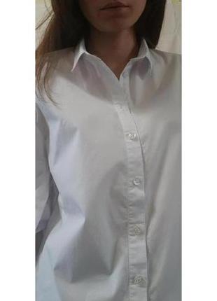 Белая рубашка с акцентом на рукава.2 фото