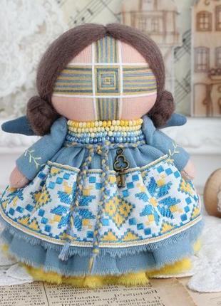 Текстильна лялька ручної роботи в українському стилі.1 фото