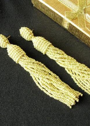 Золотые серьги кисточки из бисера