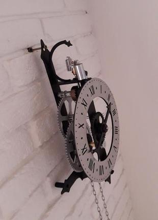 Ексклюзивні настінний механічний годинник скелетон механізм зразка xv століття, металеві1 фото