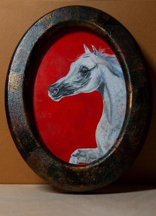 Картина коня в рамці