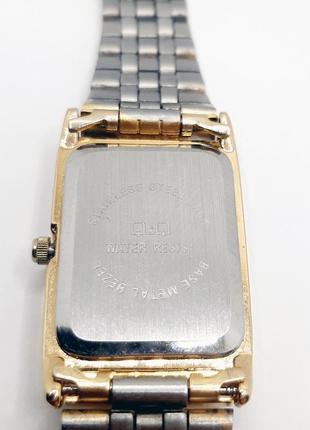 Reloj q&q base metal bezel sale