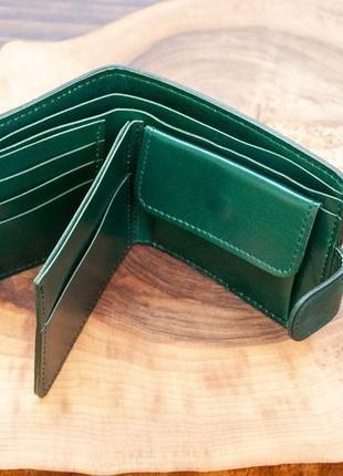 Темно-зелений гаманець на 9 відділів з натуральної шкіри з орнаментом тисненням чцмацький шлях6 фото