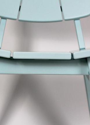 Яскравий небесно-блакитний низький стілець для вітальні та ресторанів.8 фото