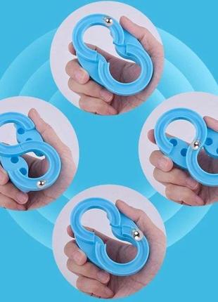 Дитяча іграшка головоломка антистрес гра нескінченна вісімка  infinity loop fidget арт 88 track5 фото