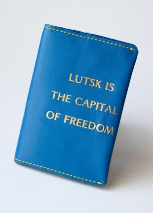 Обкладинка для паспорта "lutsk is the capital of freedom" синя з позолотою,жовта нитка.1 фото