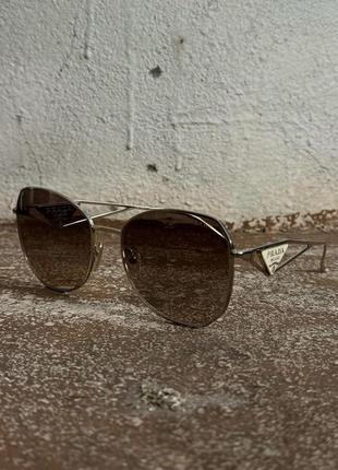 Сонцезахисні окуляри prada2 фото