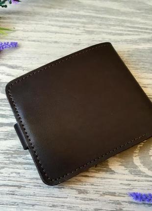 Темно-коричневый  кожаный кошелек мужской портмоне бумажник с тиснением тризуб и вышиванка на кнопке3 фото