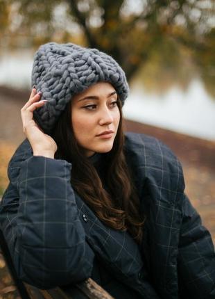 Жіноча зимова шапка з нануральної вовни мериноса. тепла в'язана шапка.2 фото