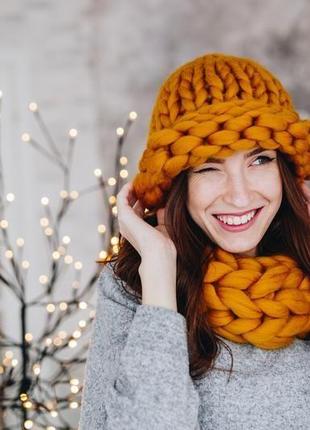 Жіноча зимова шапка з нануральної вовни мериноса. тепла в'язана шапка8 фото