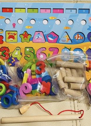 Дерев'яна іграшка навчальна дошка, 5 в 1, риболовля, математика, колористика, форми, кільця1 фото